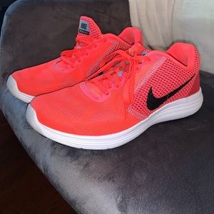 Neon pink Nike sneakers